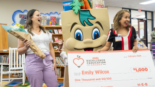  Wilcox and HEB representatives with big check